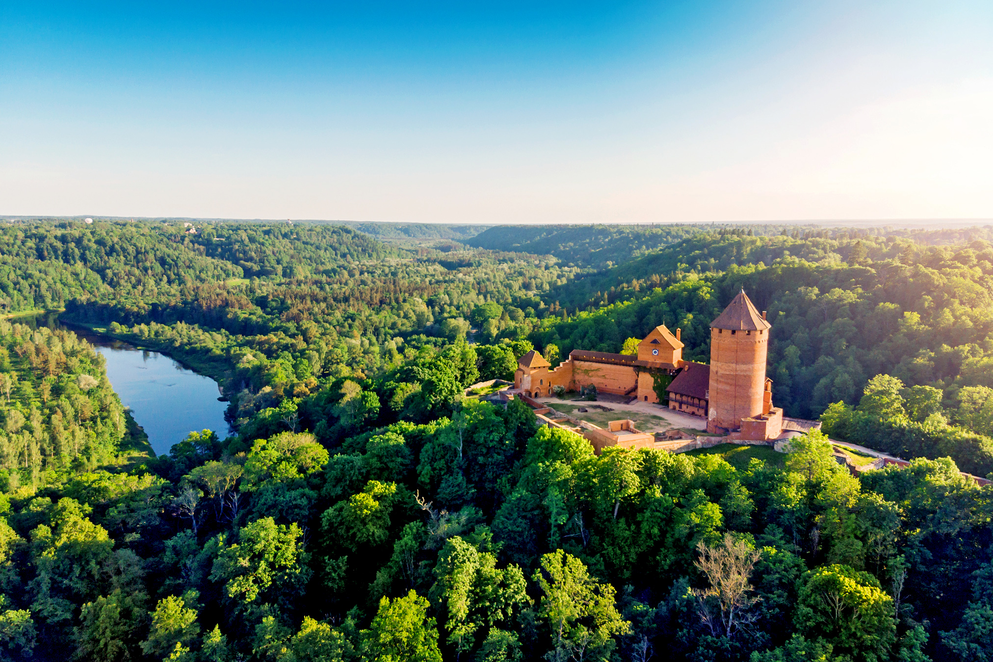 aerial view to the Turaida castle and river Gauja at sunset, Latvia